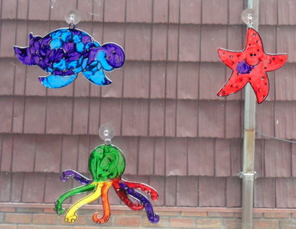 Sea-life sun-catchers - A House for Hermit Crab - Ivy Kids subscription box activities.